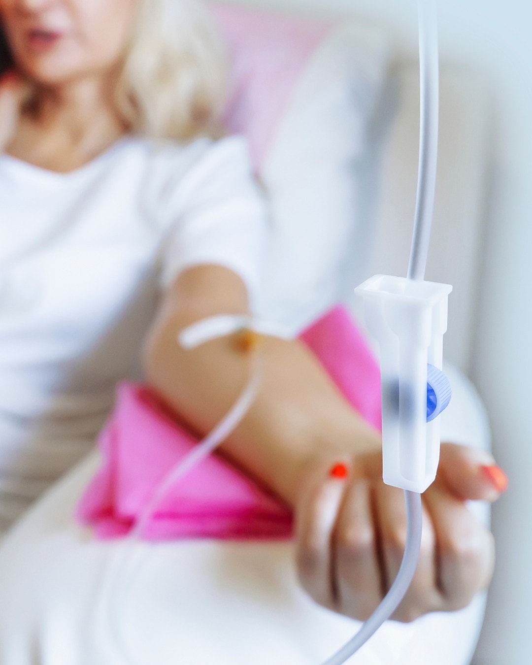 Patient receiving IV therapy treatment in charlottesville va for migraine relief