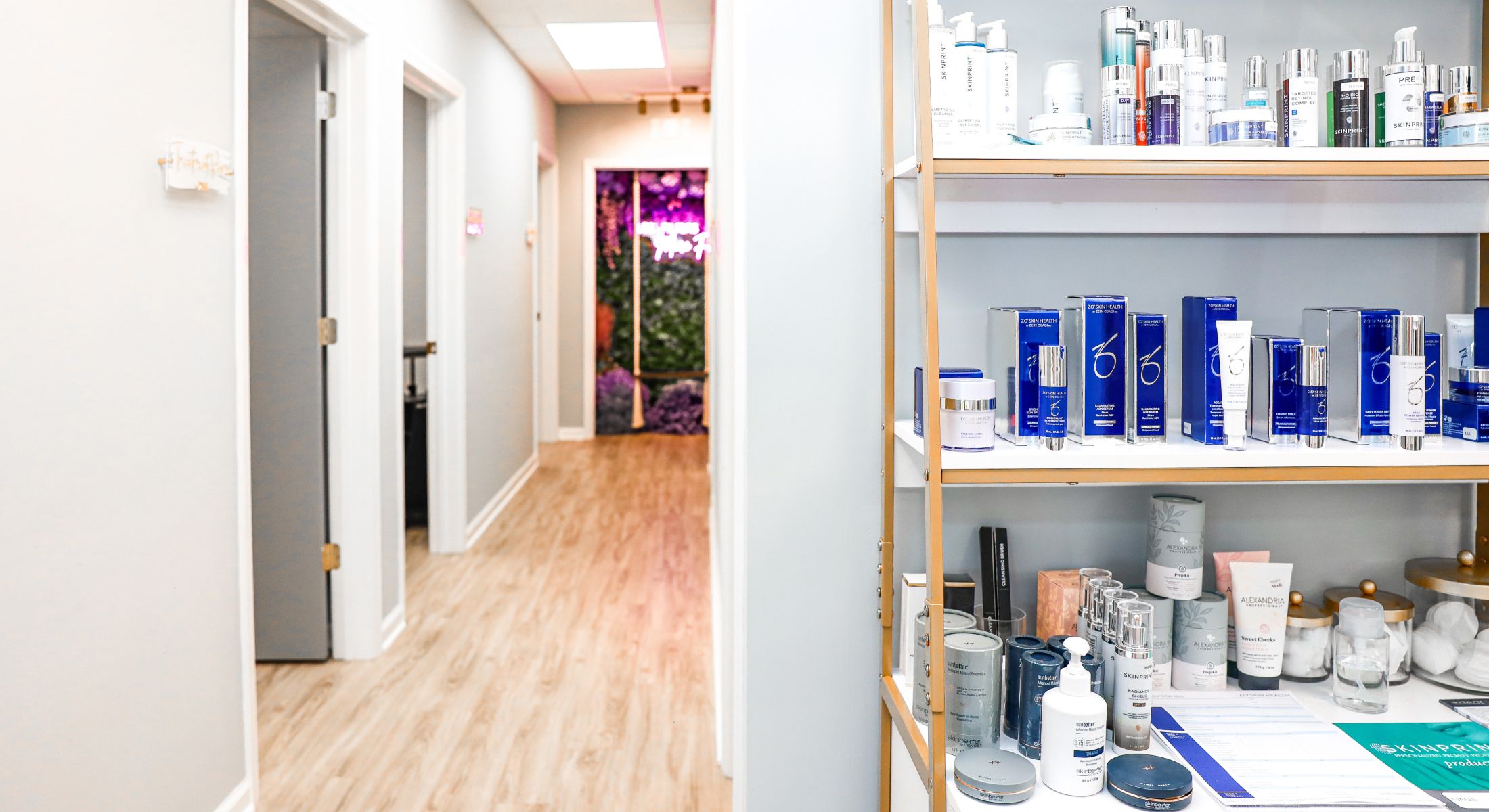 Skincare products displayed in a modern aesthetic space.