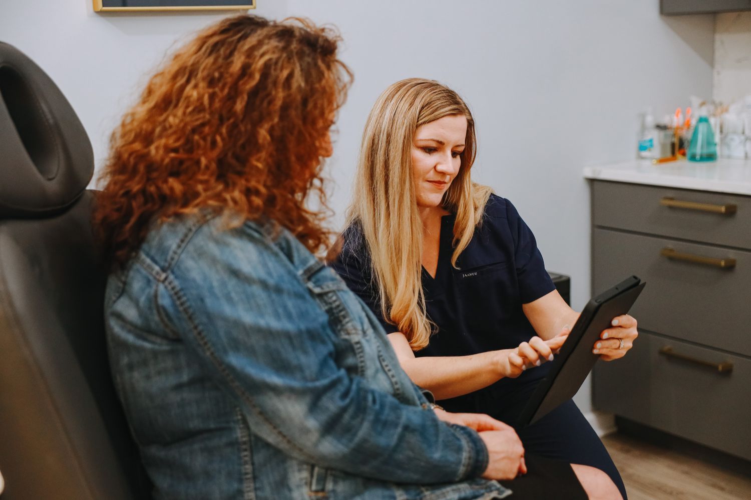 Healthcare professional consulting with a patient.